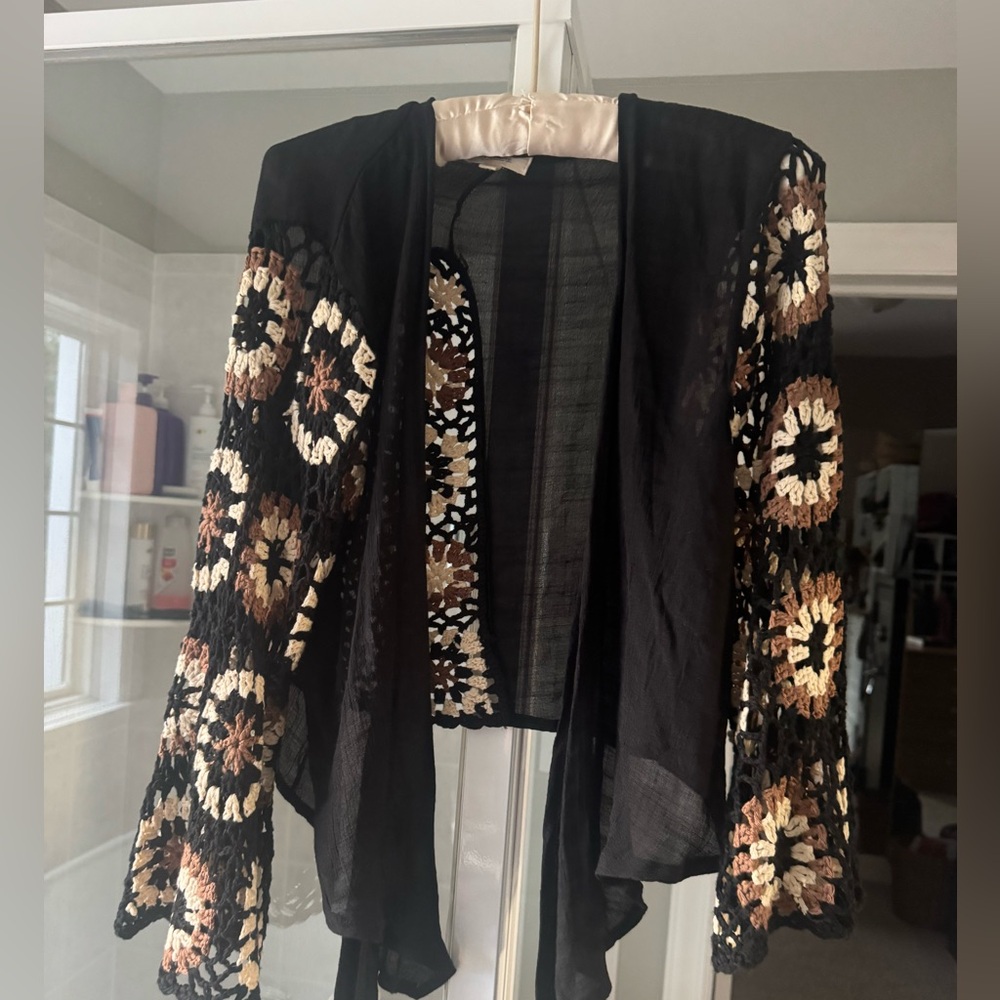 Elan Black Garment with Cream Lining Tag